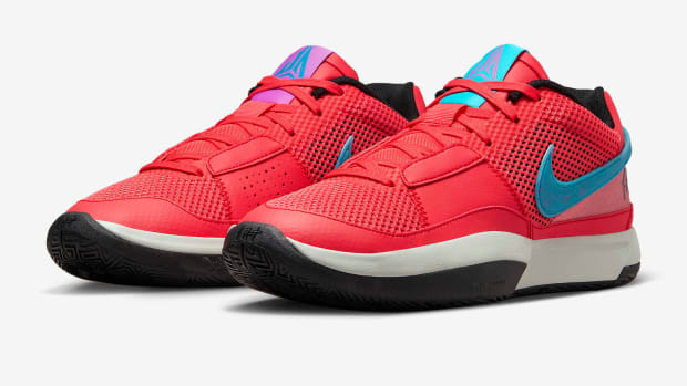 Side view of Ja Morant's red, blue, and white Nike shoes.